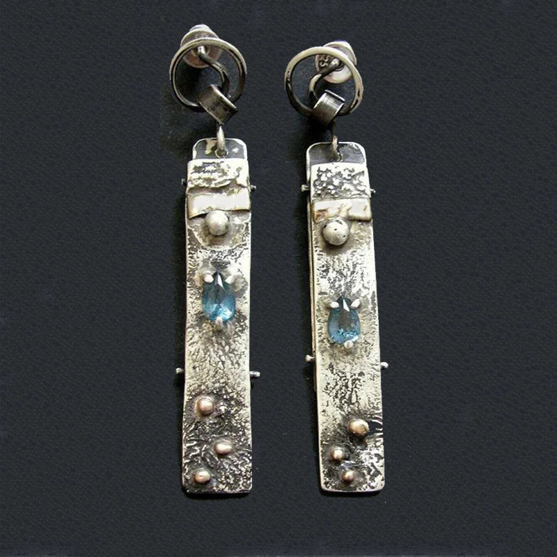 Pendientes de piedra azul hechos a mano