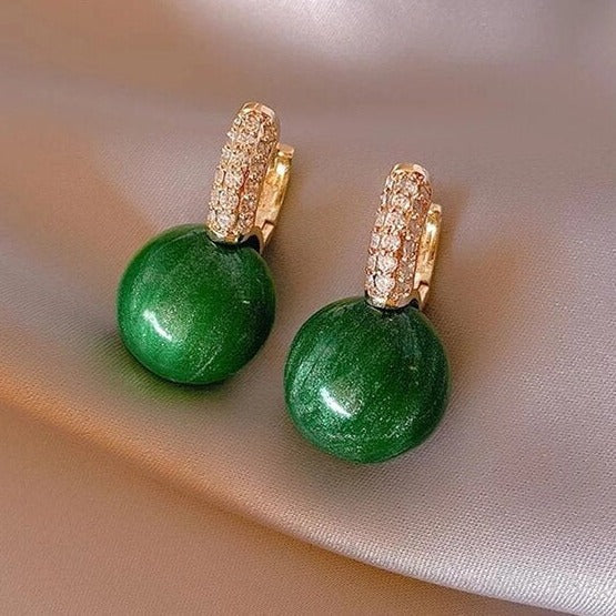 Pendientes de perlas verdes en oro