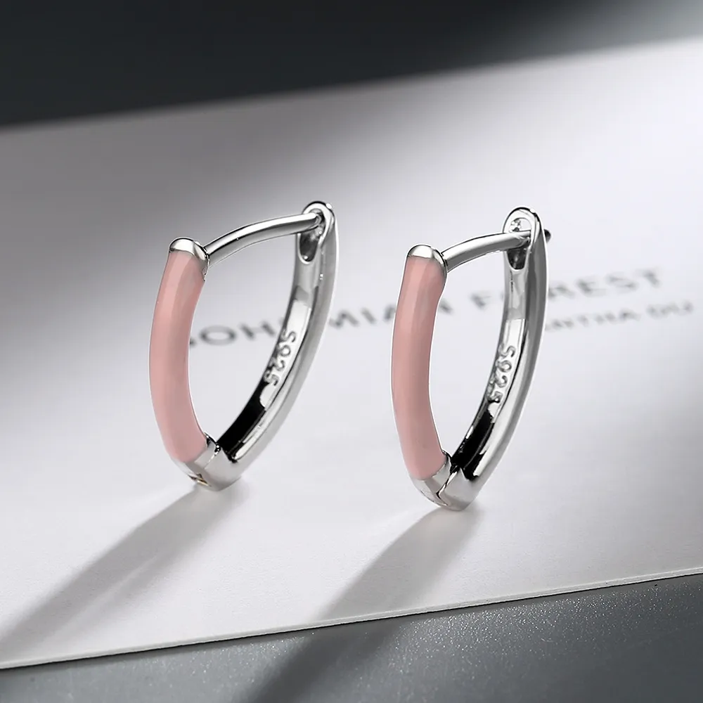Pendientes elegantes rosas en plata.