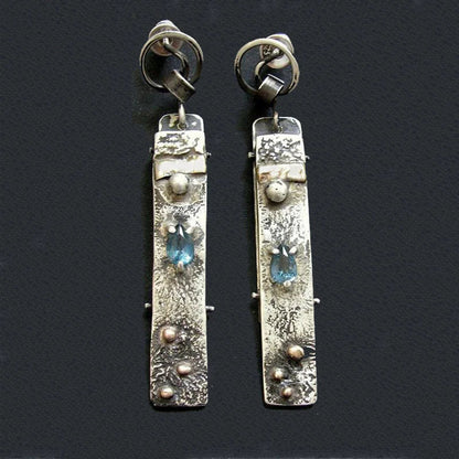 Pendientes de piedra azul hechos a mano