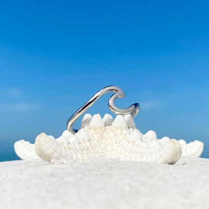 Anillo de olas de mar de plata