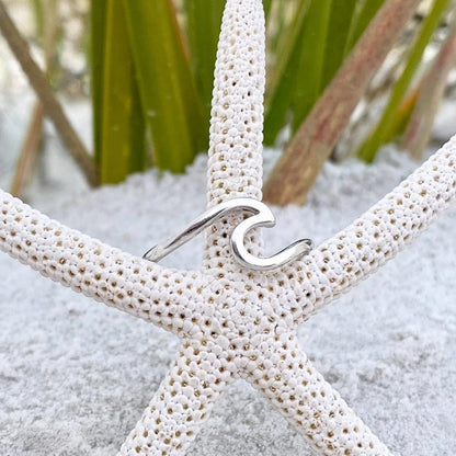 Anillo de olas de mar de plata