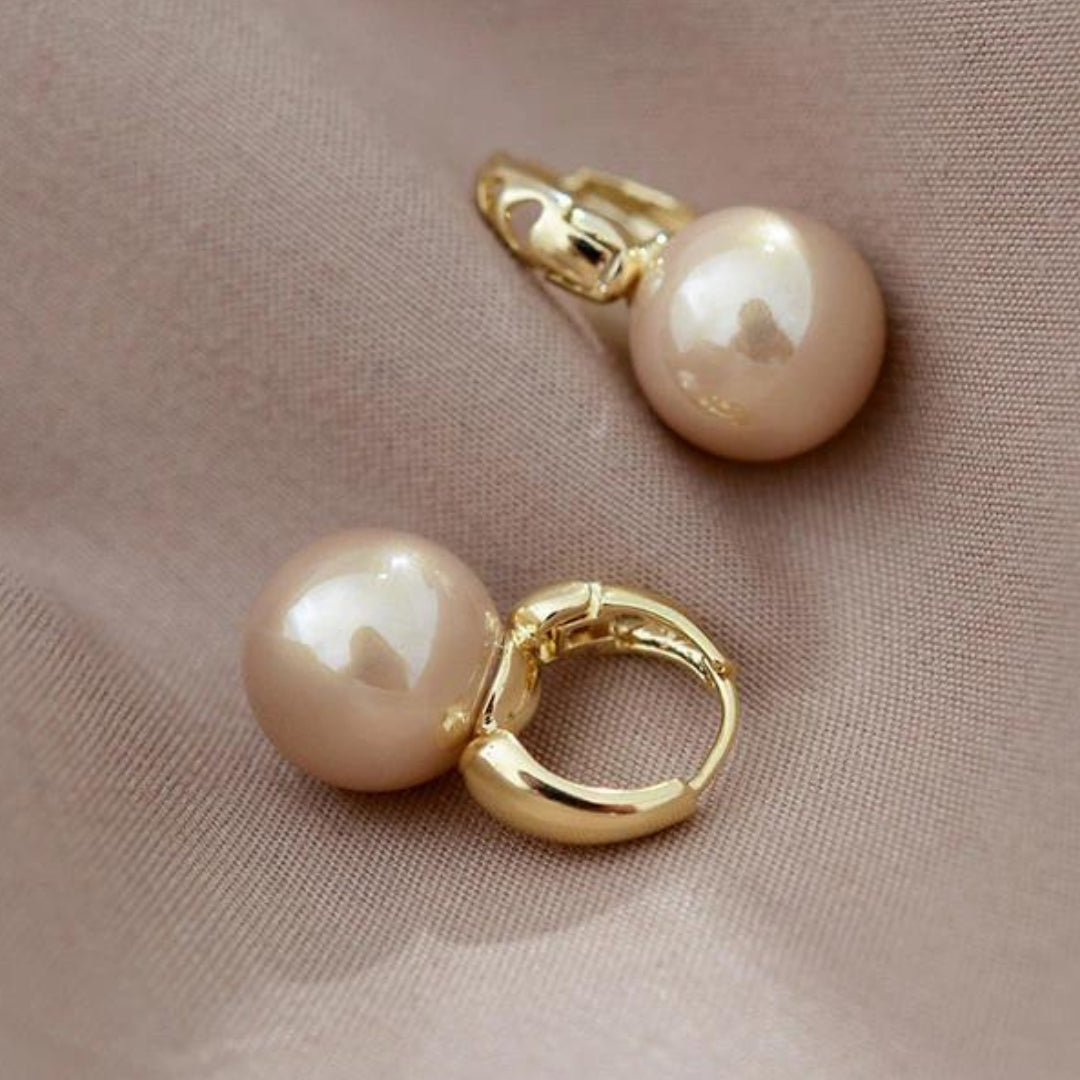 Pendientes de perlas bronceadas en oro