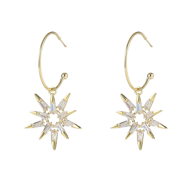Pendientes estrella en oro y plata