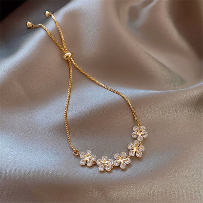 Pulsera margaritas de cristal en oro