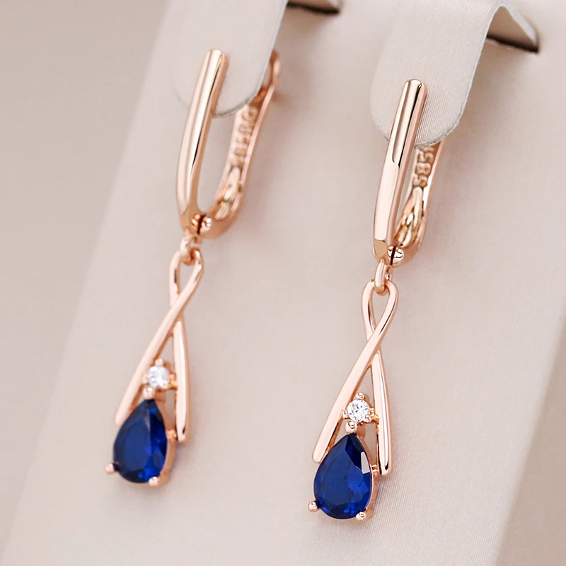 Pendientes colgantes azules en oro